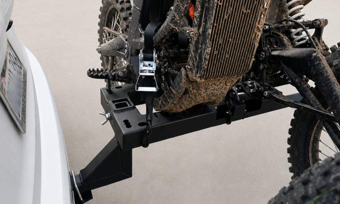 eMotorack carrier installed flat on Lincoln Navigator — rear view